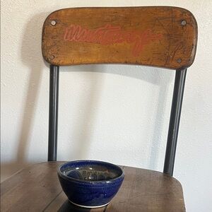 Handmade blue glazed pottery bowl with drop glaze details